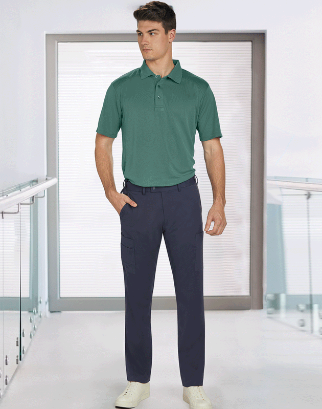 a man in a green shirt and blue pants