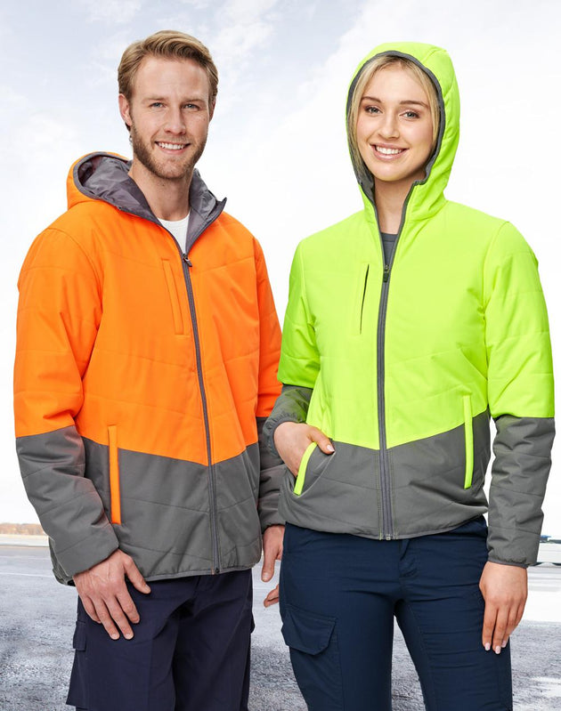 Woman and man wearing Winning Spirit fluorescent hoodies 