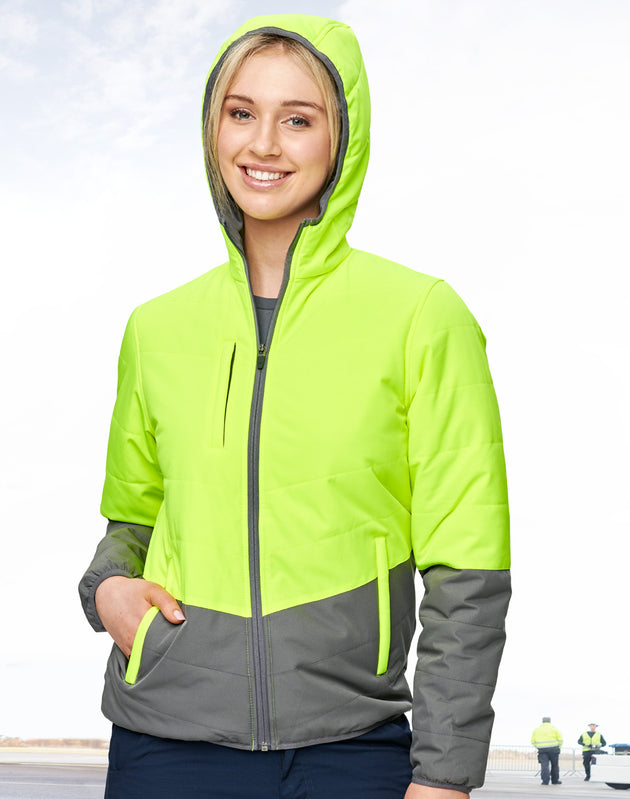 Woman wearing Winning Spirit fluorescent hoodie